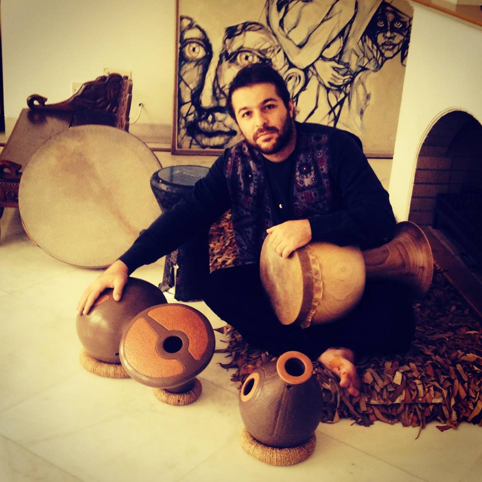 Sina playing tombak